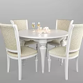 Elegant White Round Dining Table Set With Four Patterned Chairs And Decorative Wine Glasses 3d model