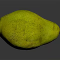 Ripe Yellow Pear With Speckled Skin On Dark Reflective Surface