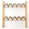 Wooden Two Tiered Rack With Silver Circular Objects Arranged On White Background