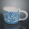 Decorative White Mug With Blue Intricate Scroll Patterns And Handle