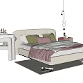 Modern Children's Bed With Green Pink Pillows Pink Blanket Side Table And Floor Lamp