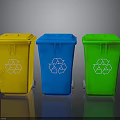 Row of Yellow Blue Green Recycling Bins With Recycle Symbols For Waste Sorting