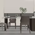 Modern Dining Table Set With Mixed Color Chairs And Green Plant In Minimalist Kitchen