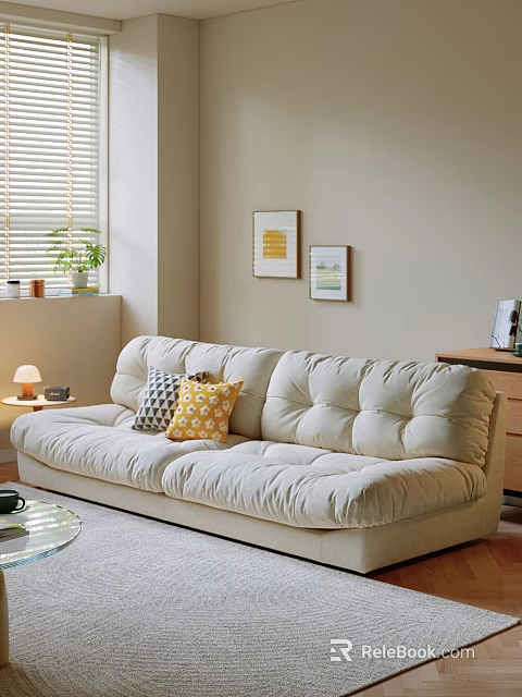 Beige Double Sofa with Geometric and Yellow Pillows Near Wall Art and Table Lamp 3d model 
