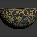 Intricately Carved Bowl With Golden Floral Patterns And Rich Red Interior