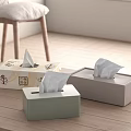 Different Colored Tissue Boxes On Wooden Table In Minimalist Home Interior