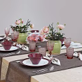 Elegant Dinnerware Set with Pink Flowers Transparent Glassware Peaches Green Vases Red Glass Cups