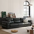 Black Leather Sectional Sofa in Modern Living Room with Decorative Pillows and Stylish Accents
