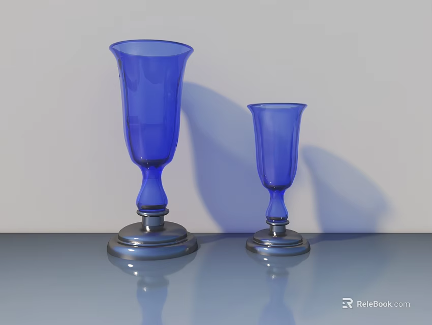 Two Blue Glass Vases With Silver Bases On Smooth Reflective Surface 3d model 