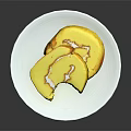 Fresh Yellow Cake Roll Slices With Cream Filling On White Plate