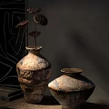 Rustic Handcrafted Ceramic Vases With Textured Earthen Tones And Dried Lotus Pods