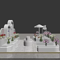 Flower Shop Interior With White Decorative Stands And Assorted Floral Displays