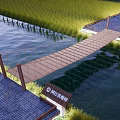 Scenic Rope Bridge With Wooden Plank Deck Over Water Area Near Rice Field