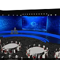 Modern Conference Venue With Blue Lighting Large Screen And Round Tables
