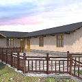 Rural Self-built House With Black Roof Stone Pavement And Curved Road Green Trees Wooden Fence