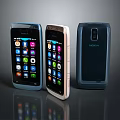 Three Nokia Mobile Phones In Blue Gold Dark Blue With App Icons On Screen