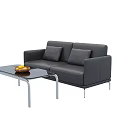 Two Seater Gray Sofa with Glass Coffee Table and Fruit Bowl in Living Room