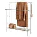 Practical Bathroom Storage Rack With Brown Towel Wicker Basket Brush And White Towels