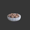 Fresh Walnuts Arranged On A White Textured Plate With Circular Design
