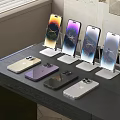 Multiple Smartphones on Stands Display Various Colors and Screen Contents