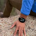 Smart Watch With Digital Display Worn On Wrist During Outdoor Activity On Rock