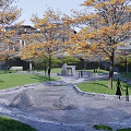 Autumn Park With Yellow Leaf Trees Green Grass Stone Path And Traditional Pavilion
