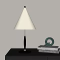 Modern Table Lamp With Conical White Shade Black Pole And Green Decor On Books