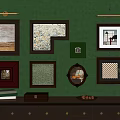 Green Wall With Multiple Frames And Dark Wooden Cabinet With Books Box Fruits And Plant