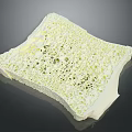 White Porous Structure With Intricate Internal Holes And Textured Surface