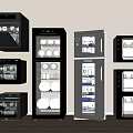 Modern Black Glass Door Kitchen Appliances Including Oven Refrigerator Sterilizer Arranged Against Wall