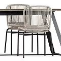 Modern Rattan Table and Chair Dining Set with Woven Seats and Metal Frame Design