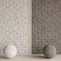 Light And Dark Gray Stone Wall Background With Spherical Decorations For Indoor Space