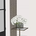 White Hydrangea Flowers in Transparent Glass Vase on Golden Metal Frame Glass Table by Window