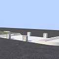 Municipal Road Design With Black Pavement White Sidewalk Square Bollards And Green Grass Area