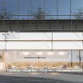 Modern Storefront Design Featuring Large Glass Walls White Facade And Black Grilles