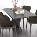 Modern Dining Table With Four Chairs And Decorative Vase Cups On Top Surface