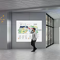 Public Wall With Orange Illuminated Hello Graphic Cartoon Character And Large Screen Showing Map Info
