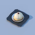 Delicious dessert with white top red decoration and crispy pastry base on black square plate