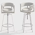 Modern Bar Stools With White Upholstered Seats And Chrome Metal Support Legs