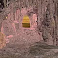 Natural Cave Interior With Stalactites Stalagmites Yellow Light And Gravel
