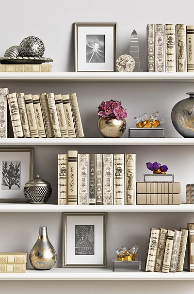 Stylish Bookshelf Display With Hardcover Books Framed Art And Decorative Vases 3d model