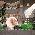 Cozy Outdoor Cafe With Moon Decor Tent Green Plants And Brick Wall Lighting