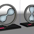 Modern Decorative Ornament Set With Circular Frame Hourglasses And Black Bases
