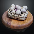 Fresh Garlic Bulbs in Wicker Basket on Wooden Cutting Board Against Black Background