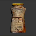 Spicy Sauce Glass Jar With Yellow Lid And Orange Content On Dark Background