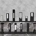 Stylish Modern Outdoor Lights With Various Pillar Designs Showcased On Marble Surface