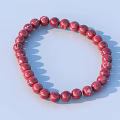 Gold Beaded Bracelet with Round Shiny Beads Displayed on Light Blue Surface 3d model