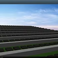 Serene Cemetery With Neatly Arranged Tombstones Green Trees And Clear Blue Sky