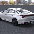 Silver Modern Sedan With Sleek Body Lines Black Wheels And Stylish Front Grille