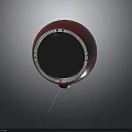 Stylish Red Circular Display Device With Circular Screen And Stand On Dark Background